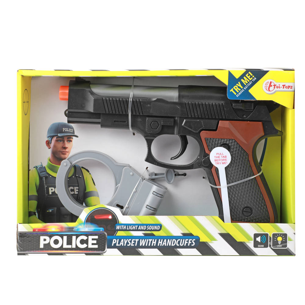 Politie pistool met handboeien